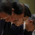 Hong Kong’s leader apologises for deadly high-rise fire