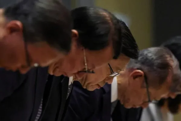 Hong Kong’s leader apologises for deadly high-rise fire